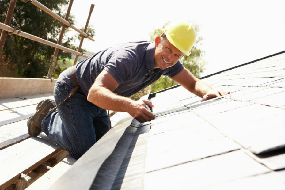 roofing contractor doing maintenance on a roof